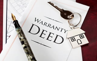 What Is a Warranty Deed? Types and How They Work in Real Estate